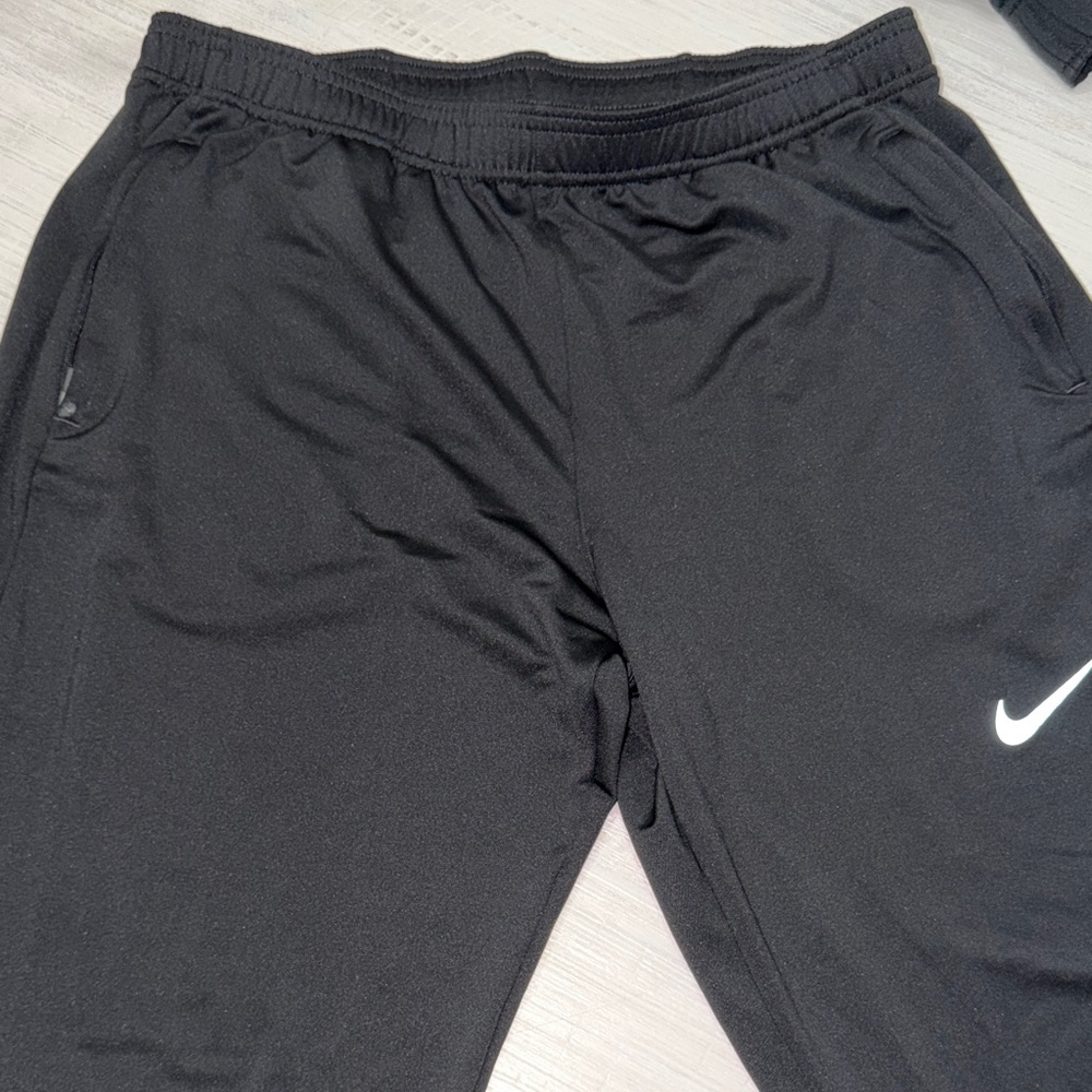 Nike Black Joggers with White Swoosh
